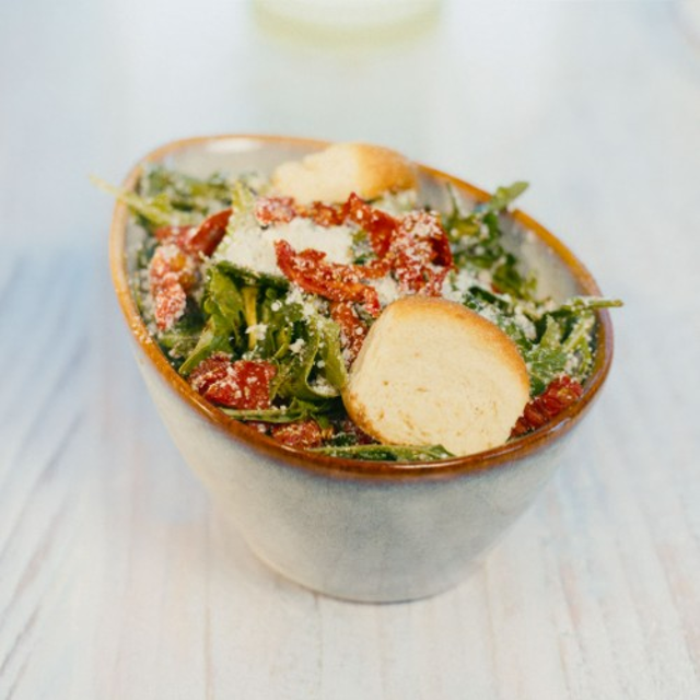Side Arugula Sun-Dried Tomato Salad.